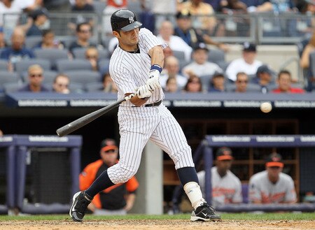 NEW YORK, NY - SEPTEMBER 05:  Jesus Montero #63 of the New York Yankees connects on a fifth inning home run against the Baltimore Orioles on September 5, 2011 at Yankee Stadium in the Bronx borough of New York City. The blast was the first in the major leagues for Montero. <br /><br /><span class="help">(Photo by Jim McIsaac/Getty Images)</span>