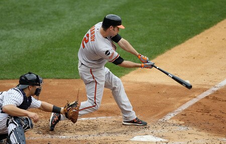 NEW YORK, NY - SEPTEMBER 05:  J.J. Hardy #2 of the Baltimore Orioles connects on a second inning RBI single against the New York Yankees on September 5, 2011 at Yankee Stadium in the Bronx borough of New York City.  <br /><br /><span class="help">(Photo by Jim McIsaac/Getty Images)</span>