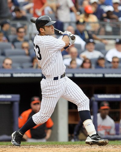 NEW YORK, NY - SEPTEMBER 05:  Jesus Montero #63 of the New York Yankees follows through on a fifth inning home run against the Baltimore Orioles on September 5, 2011 at Yankee Stadium in the Bronx borough of New York City. The blast was the first in the major leagues for Montero.  <br /><br /><span class="help">(Photo by Jim McIsaac/Getty Images)</span>