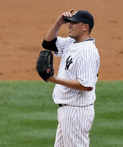 NEW YORK, NY - SEPTEMBER 05:  Freddy Garcia #36 of the New York Yankees looks on against the Baltimore Orioles on September 5, 2011 at Yankee Stadium in the Bronx borough of New York City.  <br /><br /><span class="help">(Photo by Jim McIsaac/Getty Images)</span>