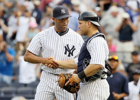 NEW YORK, NY - SEPTEMBER 05:  Mariano Rivera #42 and Russell Martin #55 of the New York Yankees celebrate after defeating the Baltimore Orioles on September 5, 2011 at Yankee Stadium in the Bronx borough of New York City.  <br /><br /><span class="help">(Photo by Jim McIsaac/Getty Images)</span>