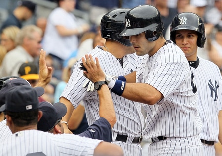 NEW YORK, NY - SEPTEMBER 05:  Jesus Montero #63 of the New York Yankees celebrates his fifth-inning home run against the Baltimore Orioles on September 5, 2011 at Yankee Stadium in the Bronx borough of New York City. The home run was the first in the major leagues for Montero.  <br /><br /><span class="help">(Photo by Jim McIsaac/Getty Images)</span>
