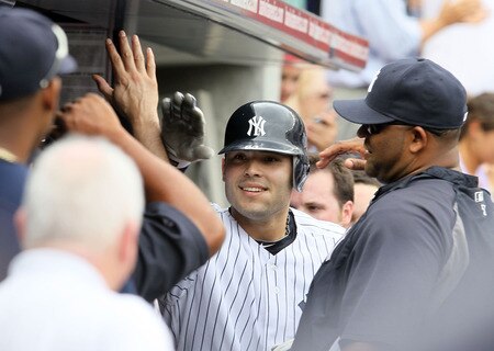 NEW YORK, NY - SEPTEMBER 05:  Jesus Montero #63 of the New York Yankees celebrates his fifth-inning home run against the Baltimore Orioles on September 5, 2011 at Yankee Stadium in the Bronx borough of New York City. The home run was the first in the major leagues for Montero.  <br /><br /><span class="help">(Photo by Jim McIsaac/Getty Images)</span>