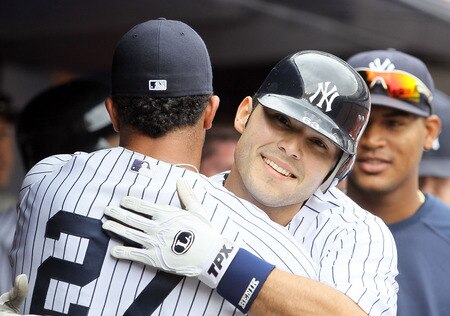 NEW YORK, NY - SEPTEMBER 05:  Jesus Montero #63 of the New York Yankees celebrates his fifth-inning home run against the Baltimore Orioles on September 5, 2011 at Yankee Stadium in the Bronx borough of New York City. The home run was the first in the major leagues for Montero.  <br /><br /><span class="help">(Photo by Jim McIsaac/Getty Images)</span>