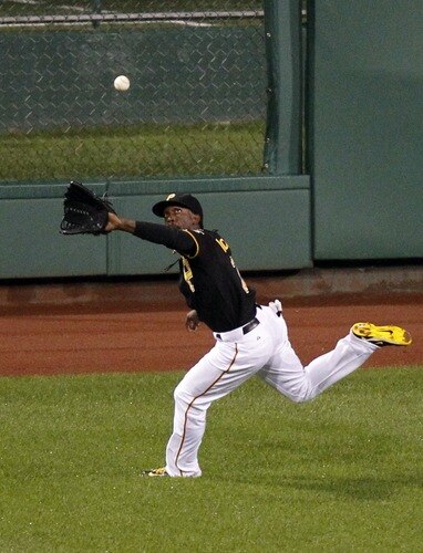 PITTSBURGH, PA - SEPTEMBER 06:  Andrew McCutchen #22 of the Pittsburgh Pirates miss plays a ball in the ninth that allowed two runs to score against the Houston Astros during the game on September 6, 2011 at PNC Park in Pittsburgh, Pennsylvania.  The Astros defeated the Pirates 4-1.  <br /><br /><span class="help">(Photo by Justin K. Aller/Getty Images)</span>