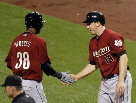 PITTSBURGH, PA - SEPTEMBER 06:  Jimmy Paredes #38 of the Houston Astros celebrates with Brian Bogusevic #19 after scoring against the Pittsburgh Pirates during the game on September 6, 2011 at PNC Park in Pittsburgh, Pennsylvania.  The Astros defeated the Pirates 4-1.  <br /><br /><span class="help">(Photo by Justin K. Aller/Getty Images)</span>