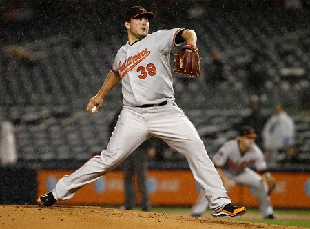 NEW YORK - SEPTEMBER 06:  Tommy Hunter #39 of the Baltimore Orioles delivers during a game against the New York Yankees at Yankee Stadium on September 6, 2011 in the Bronx Borough of New York City.  <br /><br /><span class="help">(Photo by Jeff Zelevansky/Getty Images)</span>