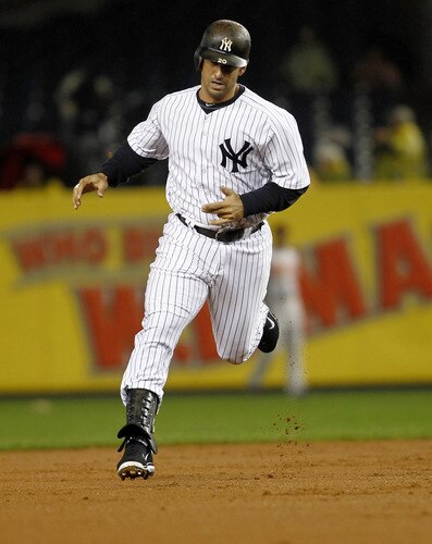 NEW YORK - SEPTEMBER 06:  Jorge Posada #20 of the New York Yankees rounds the bases on his solo home run against the Baltimore Orioles at Yankee Stadium on September 6, 2011 in the Bronx Borough of New York City.  <br /><br /><span class="help">(Photo by Jeff Zelevansky/Getty Images)</span>