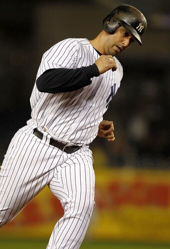 NEW YORK - SEPTEMBER 06:  Jorge Posada #20 of the New York Yankees rounds the bases on his solo home run against the Baltimore Orioles at Yankee Stadium on September 6, 2011 in the Bronx Borough of New York City.  <br /><br /><span class="help">(Photo by Jeff Zelevansky/Getty Images)</span>