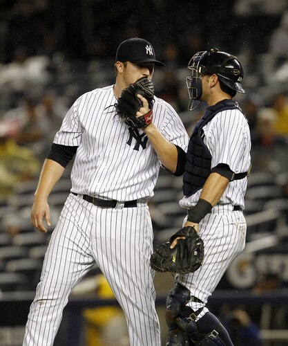 NEW YORK - SEPTEMBER 06:  Phil Hughes #65 confers with Francisco Cervelli #17 of the New York Yankees during a game against Baltimore Orioles at Yankee Stadium on September 6, 2011 in the Bronx Borough of New York City.  <br /><br /><span class="help">(Photo by Jeff Zelevansky/Getty Images)</span>