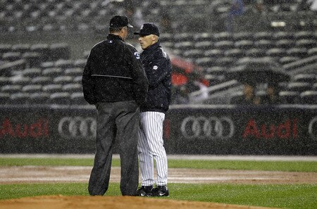 NEW YORK - SEPTEMBER 06:  Joe Girardi #28, manager of the New York Yankees talks with umpire Rob Drake during a game against the Baltimore Orioles at Yankee Stadium on September 6, 2011 in the Bronx Borough of New York City.  <br /><br /><span class="help">(Photo by Jeff Zelevansky/Getty Images)</span>