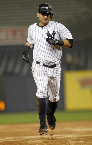 NEW YORK - SEPTEMBER 06:  Francisco Cervelli #17 of the New York Yankees rounds the bases on his solo home run in a game against the Baltimore Orioles at Yankee Stadium on September 6, 2011 in the Bronx Borough of New York City.  <br /><br /><span class="help">(Photo by Jeff Zelevansky/Getty Images)</span>