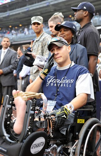 NEW YORK, NY - SEPTEMBER 07:  U.S. Army Specialist Sergio Cano wipes tears from his face during a pregame ceremony commemorating the Tenth Anniversary of the September 11th attacks on September 7, 2011 at Yankee Stadium in the Bronx borough of New York City. <br /><br /><span class="help">(Photo by Christopher Pasatieri/Getty Images)</span>