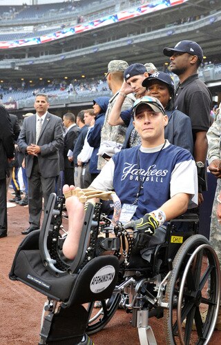 NEW YORK, NY - SEPTEMBER 07:  U.S. Army Specialist Sergio Cano cries during a pregame ceremony commemorating the Tenth Anniversary of the September 11th attacks on September 7, 2011 at Yankee Stadium in the Bronx borough of New York City. <br /><br /><span class="help">(Photo by Christopher Pasatieri/Getty Images)</span>