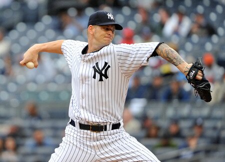 NEW YORK, NY - SEPTEMBER 07: A.J. Burnett #34 of the New York Yankees throws a pitch during the top of the fourth inning against the Baltimore Orioles on September 7, 2011 at Yankee Stadium in the Bronx borough of New York City. <br /><br /><span class="help">(Photo by Christopher Pasatieri/Getty Images)</span>