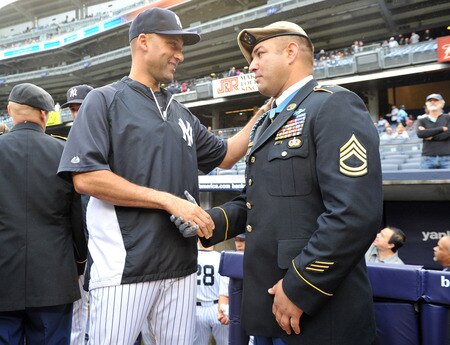 NEW YORK, NY - SEPTEMBER 07: Derek Jeter #2 of the New York Yankees (L) shakes hands with Metal of Honor recipient Leroy Petry (R) during a pregame ceremony commemorating the Tenth Anniversary of the September 11th attacks on America in 2001 on September 7, 2011 at Yankee Stadium in the Bronx borough of New York City. <br /><br /><span class="help">(Photo by Christopher Pasatieri/Getty Images)</span>
