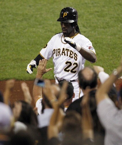 PITTSBURGH, PA - SEPTEMBER 07:  Andrew McCutchen #22 of the Pittsburgh Pirates celebrates his three-run home run in the fifth inning against the Houston Astros during the game on September 7, 2011 at PNC Park in Pittsburgh, Pennsylvania.  <br /><br /><span class="help">(Photo by Justin K. Aller/Getty Images)</span>