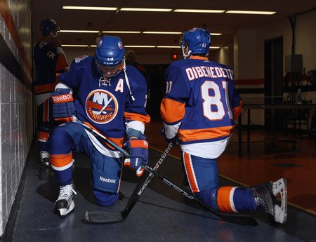 UNIONDALE, NY - SEPTEMBER 12: (L-R) Mark Katic #71 and Justin DiBenedetto #81 of the New York Islanders wait for warmups to begin prior to their game against the Boston Bruins at the Nassau Coliseum on September 12, 2011 in Uniondale, New York.  <br /><br /><span class="help">(Photo by Bruce Bennett/Getty Images)</span>