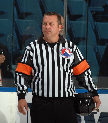 UNIONDALE, NY - SEPTEMBER 12: Referee Terry Koharski #10 prepares to work the game between the Boston Bruins and the New York Islanders at Nassau Coliseum on September 12, 2011 in Uniondale, New York.  <br /><br /><span class="help">(Photo by Bruce Bennett/Getty Images)</span>