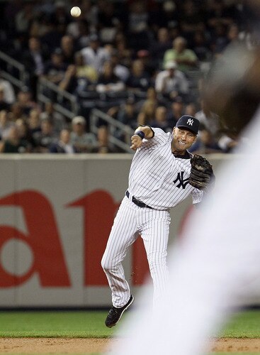 NEW YORK, NY - SEPTEMBER 22:  Derek Jeter #2 of the New York Yankees commits a throwing error in the second inning against the Tampa Bay Rays on September 22, 2011 at Yankee Stadium in the Bronx borough of New York City.  <br /><br /><span class="help">(Photo by Jim McIsaac/Getty Images)</span>