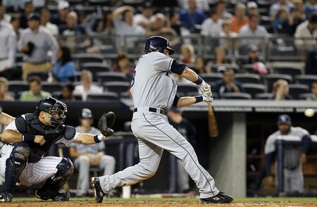 NEW YORK, NY - SEPTEMBER 22:  Ben Zobrist #18 of the Tampa Bay Rays connects on a third-inning two-run home run against the New York Yankees on September 22, 2011 at Yankee Stadium in the Bronx borough of New York City.  <br /><br /><span class="help">(Photo by Jim McIsaac/Getty Images)</span>