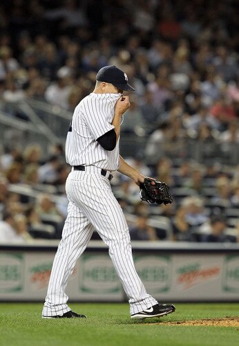 NEW YORK, NY - SEPTEMBER 22:  Scott Proctor #41 of the New York Yankees walks to the mound against the New York Yankees on September 22, 2011 at Yankee Stadium in the Bronx borough of New York City.  <br /><br /><span class="help">(Photo by Jim McIsaac/Getty Images)</span>