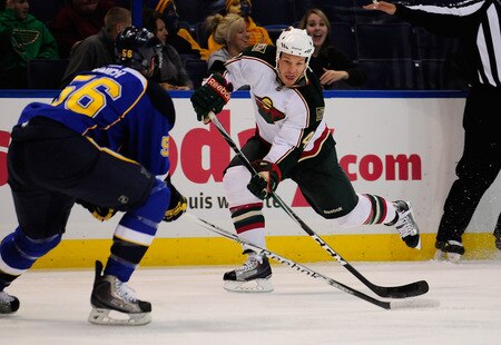 ST. LOUIS, MO - SEPTEMBER 22: Warren Peters #43 of the Minnesota Wild shoots as Brett Ponich #56 of the St. Louis Blues defends at Scottrade Center on September 22, 2011 in St. Louis, Missouri.  <br /><br /><span class="help">(Photo by Jeff Curry/Getty Images)</span>