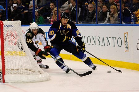 ST. LOUIS, MO - SEPTEMBER 22: Alexander Steen #20 of the St. Louis Blues handles the puck as Jared Spurgeon #46 of the Minnesota Wild gives chase at Scottrade Center on September 22, 2011 in St. Louis, Missouri.  <br /><br /><span class="help">(Photo by Jeff Curry/Getty Images)</span>
