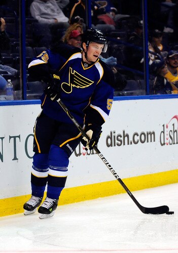ST. LOUIS, MO - SEPTEMBER 22: Danny Syvret #55 of the St. Louis Blues handles the puck against the Minnesota Wild at Scottrade Center on September 22, 2011 in St. Louis, Missouri.  <br /><br /><span class="help">(Photo by Jeff Curry/Getty Images)</span>