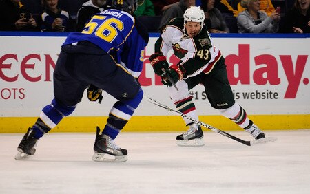 ST. LOUIS, MO - SEPTEMBER 22: Warren Peters #43 of the Minnesota Wild shoots as Brett Ponich #56 of the St. Louis Blues defends at Scottrade Center on September 22, 2011 in St. Louis, Missouri.  <br /><br /><span class="help">(Photo by Jeff Curry/Getty Images)</span>