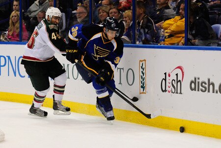 ST. LOUIS, MO - SEPTEMBER 22: Jared Spurgeon #46 of the Minnesota Wild defends against Philip McRae #39 of the St. Louis Blues at Scottrade Center on September 22, 2011 in St. Louis, Missouri.  <br /><br /><span class="help">(Photo by Jeff Curry/Getty Images)</span>