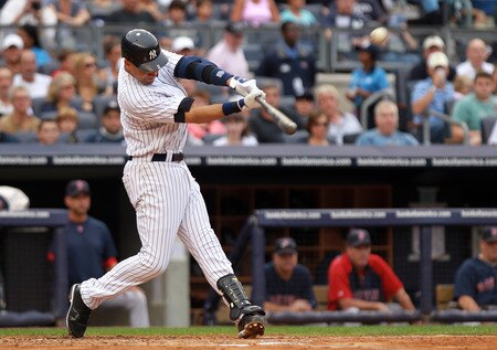 NEW YORK, NY - SEPTEMBER 24:  Derek Jeter #2 of the New York Yankees hits a three RBI home run in the second inning against the Boston Red Sox on September 24, 2011 at Yankee Stadium in the Bronx borough of New York City.  <br /><br /><span class="help">(Photo by Nick Laham/Getty Images)</span>