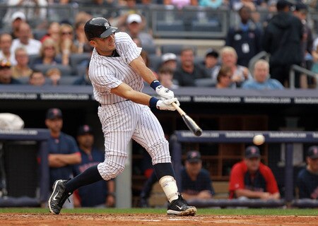 NEW YORK, NY - SEPTEMBER 24: Jesus Motero #63 of the New York Yankees hits an RBI single in the second inning against the Boston Red Sox on September 24, 2011 at Yankee Stadium in the Bronx borough of New York City.  <br /><br /><span class="help">(Photo by Nick Laham/Getty Images)</span>