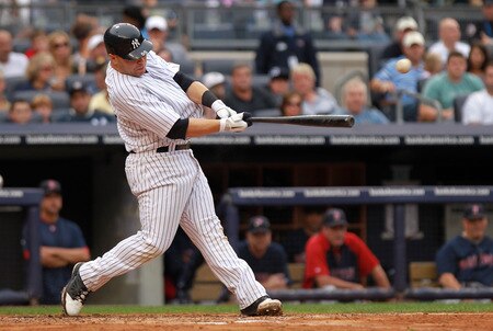 NEW YORK, NY - SEPTEMBER 24: Russell Martin #55 of the New York Yankees hits a two RBI single in the second inning against the Boston Red Sox on September 24, 2011 at Yankee Stadium in the Bronx borough of New York City.  <br /><br /><span class="help">(Photo by Nick Laham/Getty Images)</span>