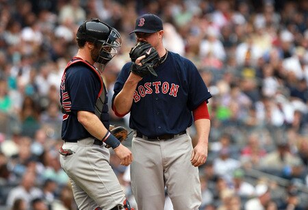 NEW YORK, NY - SEPTEMBER 24:  Jon Lester #31 of the Boston Red Sox talks with catcher Jarrod Saltalamacchia #39 against the New York Yankees on September 24, 2011 at Yankee Stadium in the Bronx borough of New York City.  <br /><br /><span class="help">(Photo by Nick Laham/Getty Images)</span>
