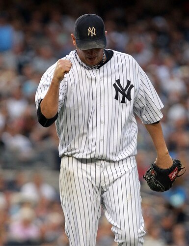 NEW YORK, NY - SEPTEMBER 24:  Freddy Garcia #36 of the New York Yankees celebrates an inning ending out against the Boston Red Sox on September 24, 2011 at Yankee Stadium in the Bronx borough of New York City.  <br /><br /><span class="help">(Photo by Nick Laham/Getty Images)</span>