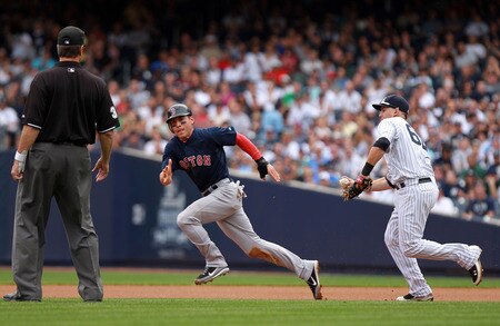 NEW YORK, NY - SEPTEMBER 25: Brandon Laird #60 of the New York Yankees runs down Jacoby Ellsbury #2 of the Boston Red Sox in the first inning on September 25, 2011 at Yankee Stadium in the Bronx borough of New York City.  <br /><br /><span class="help">(Photo by Nick Laham/Getty Images)</span>