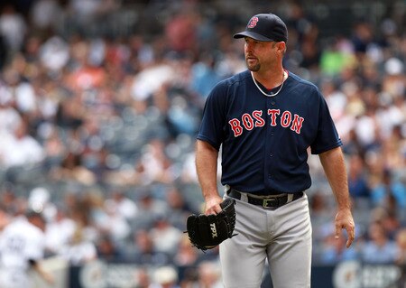 NEW YORK, NY - SEPTEMBER 25:  Tim Wakefield #49 of the Boston Red Sox walks to the dugout against the New York Yankees on September 25, 2011 at Yankee Stadium in the Bronx borough of New York City.  <br /><br /><span class="help">(Photo by Nick Laham/Getty Images)</span>