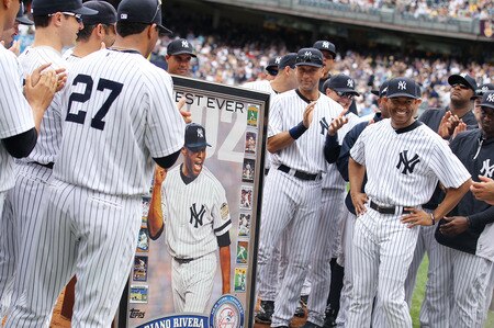 NEW YORK, NY - SEPTEMBER 25: Mariano Rivera #42 of the New York Yankees is presented with a framed picture during a ceremony to celebrate his record 602nd career save prior to the game against the Boston Red Sox on September 25, 2011 at Yankee Stadium in the Bronx borough of New York City.  <br /><br /><span class="help">(Photo by Nick Laham/Getty Images)</span>