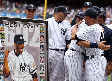 NEW YORK, NY - SEPTEMBER 25:  Mariano Rivera #42 of the New York Yankees hugs teammate Derek Jeter #2 during a ceremony to celebrate his record 602nd career save prior to the game against the Boston Red Sox on September 25, 2011 at Yankee Stadium in the Bronx borough of New York City.  <br /><br /><span class="help">(Photo by Nick Laham/Getty Images)</span>