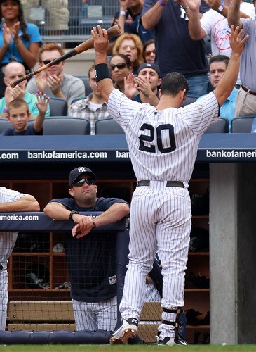 NEW YORK, NY - SEPTEMBER 25:  Jorge Posada #20 of the New York Yankees waves to the crowd after hitting a 2 RBI home run in the third inning against the Boston Red Sox on September 25, 2011 at Yankee Stadium in the Bronx borough of New York City.  <br /><br /><span class="help">(Photo by Nick Laham/Getty Images)</span>