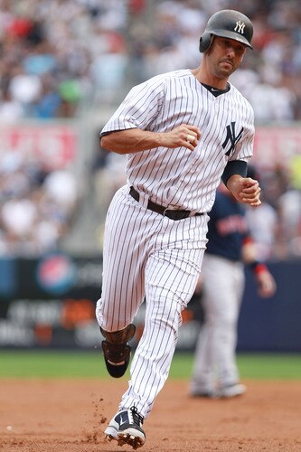 NEW YORK, NY - SEPTEMBER 25: Jorge Posada #20 of the New York Yankees rounds the bases after hitting a 2 RBI home run in the third inning against the Boston Red Sox on September 25, 2011 at Yankee Stadium in the Bronx borough of New York City.  <br /><br /><span class="help">(Photo by Nick Laham/Getty Images)</span>