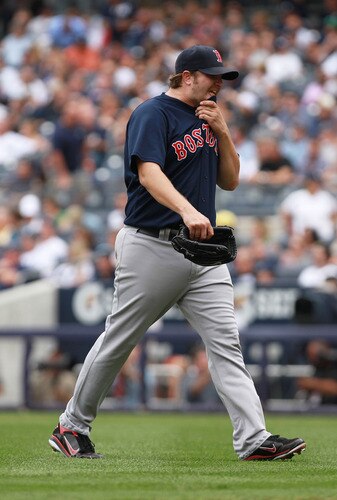 NEW YORK, NY - SEPTEMBER 25:  Matt Albers #32 of the Boston Red Sox walks to the dugout after being pulled from the game in the sixth inning against the New York Yankees on September 25, 2011 at Yankee Stadium in the Bronx borough of New York City.  <br /><br /><span class="help">(Photo by Nick Laham/Getty Images)</span>