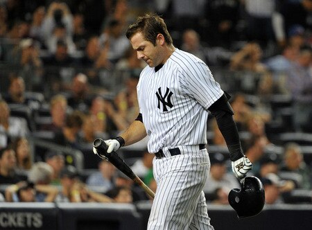 NEW YORK, NY - SEPTEMBER 25: Austin Romine #71 of the New York Yankees reacts after striking out with the bases loaded to end the bottom of the ninth inning against the Boston Red Sox on September 25, 2011 at Yankee Stadium in the Bronx borough of New York City. <br /><br /><span class="help">(Photo by Christopher Pasatieri/Getty Images)</span>