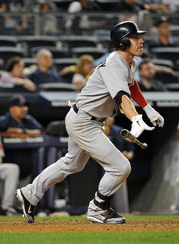 NEW YORK, NY - SEPTEMBER 25: Jacoby Ellsbury #2 of the Boston Red Sox watches his three-run home run in the top of the 14th inning against the New York Yankees on September 25, 2011 at Yankee Stadium in the Bronx borough of New York City. <br /><br /><span class="help">(Photo by Christopher Pasatieri/Getty Images)</span>