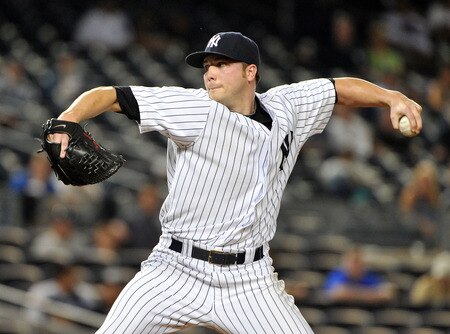 NEW YORK, NY - SEPTEMBER 25: Aaron Laffey #22 of the New York Yankees throws a pitch in the top of the 13th inning against the Boston Red Sox on September 25, 2011 at Yankee Stadium in the Bronx borough of New York City. <br /><br /><span class="help">(Photo by Christopher Pasatieri/Getty Images)</span>