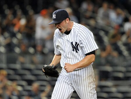 NEW YORK, NY - SEPTEMBER 25: Aaron Laffey #22 of the New York Yankees reacts after striking out Lars Anderson #62 of the Boston Red Sox (not pictured) to end the top of the 13th inning against the Boston Red Sox on September 25, 2011 at Yankee Stadium in the Bronx borough of New York City. <br /><br /><span class="help">(Photo by Christopher Pasatieri/Getty Images)</span>