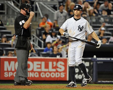 NEW YORK, NY - SEPTEMBER 25: Brett Gardner #11 of the New York Yankees reacts after striking out to end the bottom of the 13th inning against the Boston Red Sox on September 25, 2011 at Yankee Stadium in the Bronx borough of New York City. <br /><br /><span class="help">(Photo by Christopher Pasatieri/Getty Images)</span>
