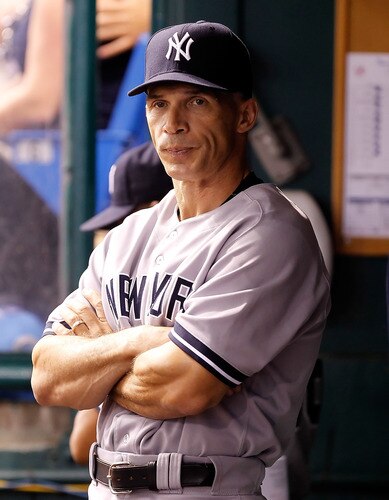ST. PETERSBURG, FL - SEPTEMBER 26:  Manager Joe Girardi #28 of the New York Yankees directs his team against the Tampa Bay Rays during the game at Tropicana Field on September 26, 2011 in St. Petersburg, Florida.  <br /><br /><span class="help">(Photo by J. Meric/Getty Images)</span>