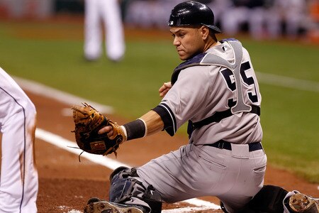 ST. PETERSBURG, FL - SEPTEMBER 26:  Catcher Russell Martin #55 of the New York Yankees turns and makes the tag on B.J. Upton #2 of the Tampa Bay Rays during the game at Tropicana Field on September 26, 2011 in St. Petersburg, Florida.  <br /><br /><span class="help">(Photo by J. Meric/Getty Images)</span>